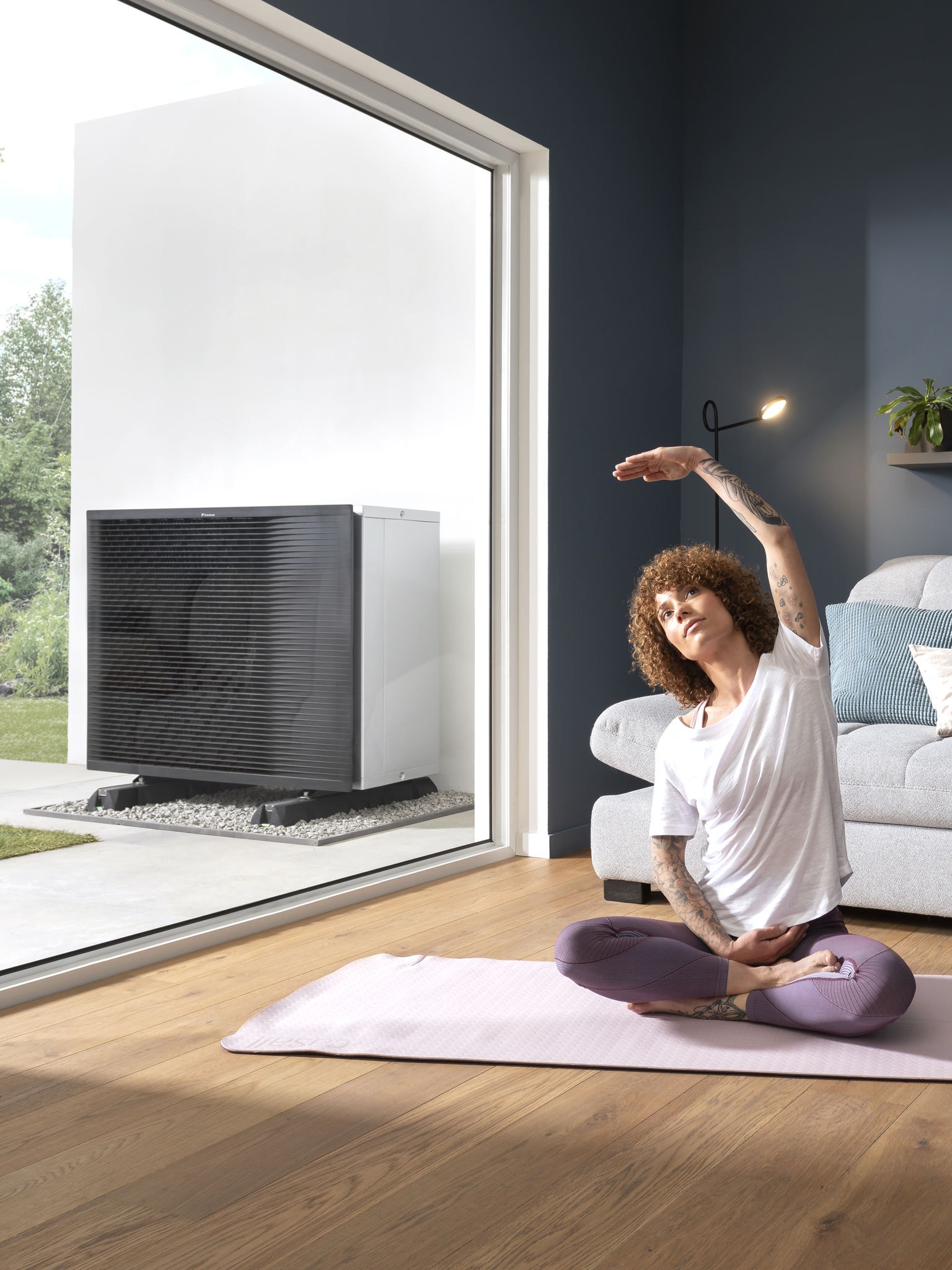 Woman doing yoga in her living room